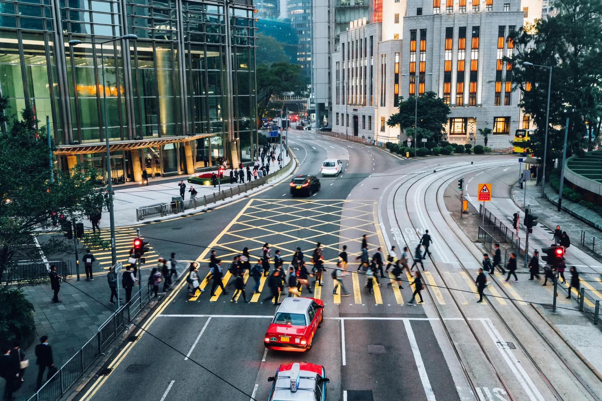 Pedestrians Crossing Street in Hong Kong
