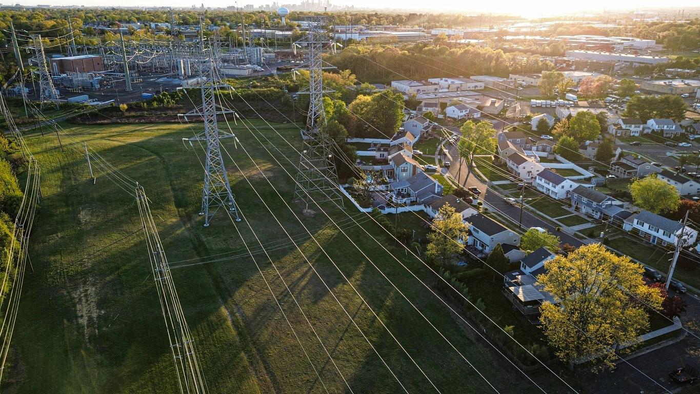 Aerial view of a neighborhood in South New Jersey through electrical wires. 