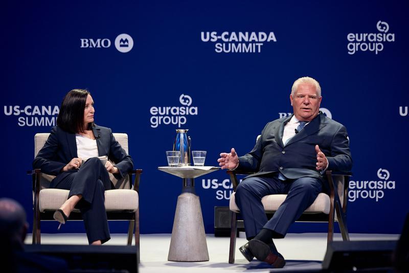 Amanda Lang and Doug Ford on stage at the US-Canada Summit