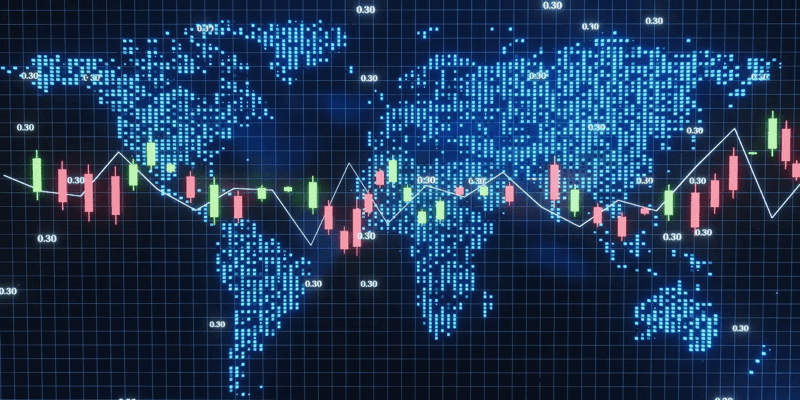 Digital world map overlaid with financial candlestick charts and trend lines, representing global markets and data analytics