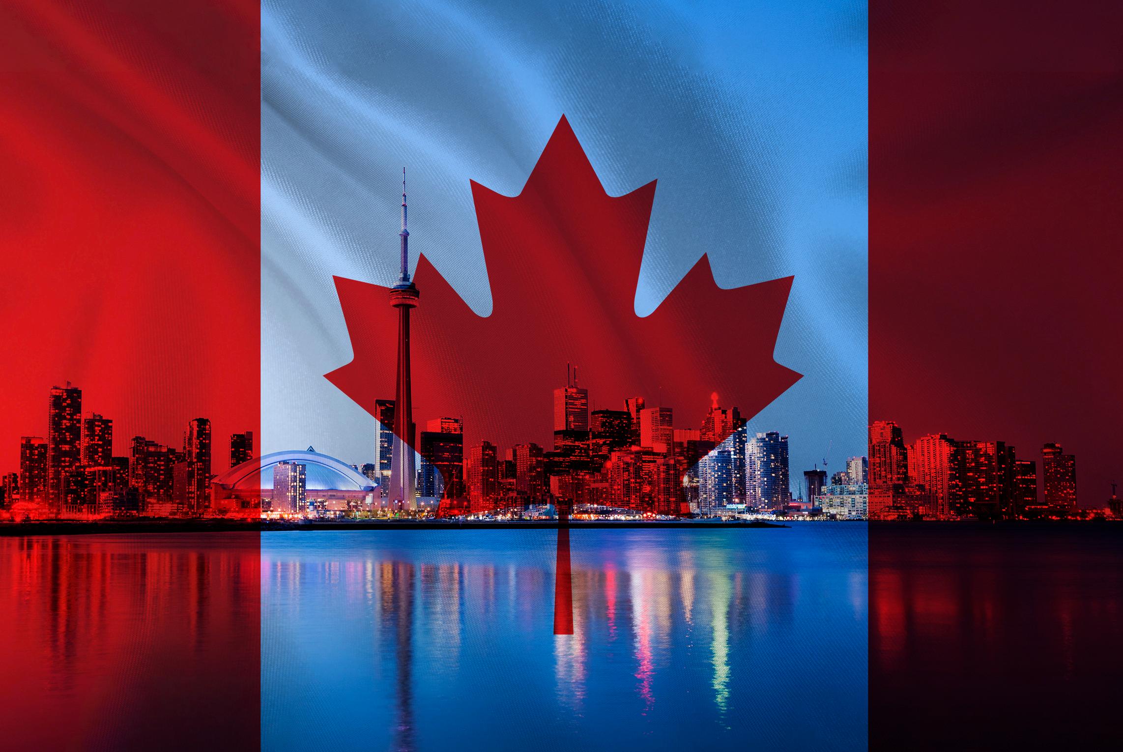 Toronto cityscape with Canadian flag in the background
