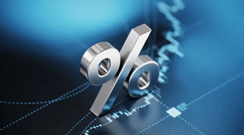 Image showing a 3D percentage sign in silver on a deep blue background that has stock charts behind it
