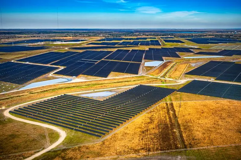 Aerial view of a large solar energy facility located in Liverpool, Texas.