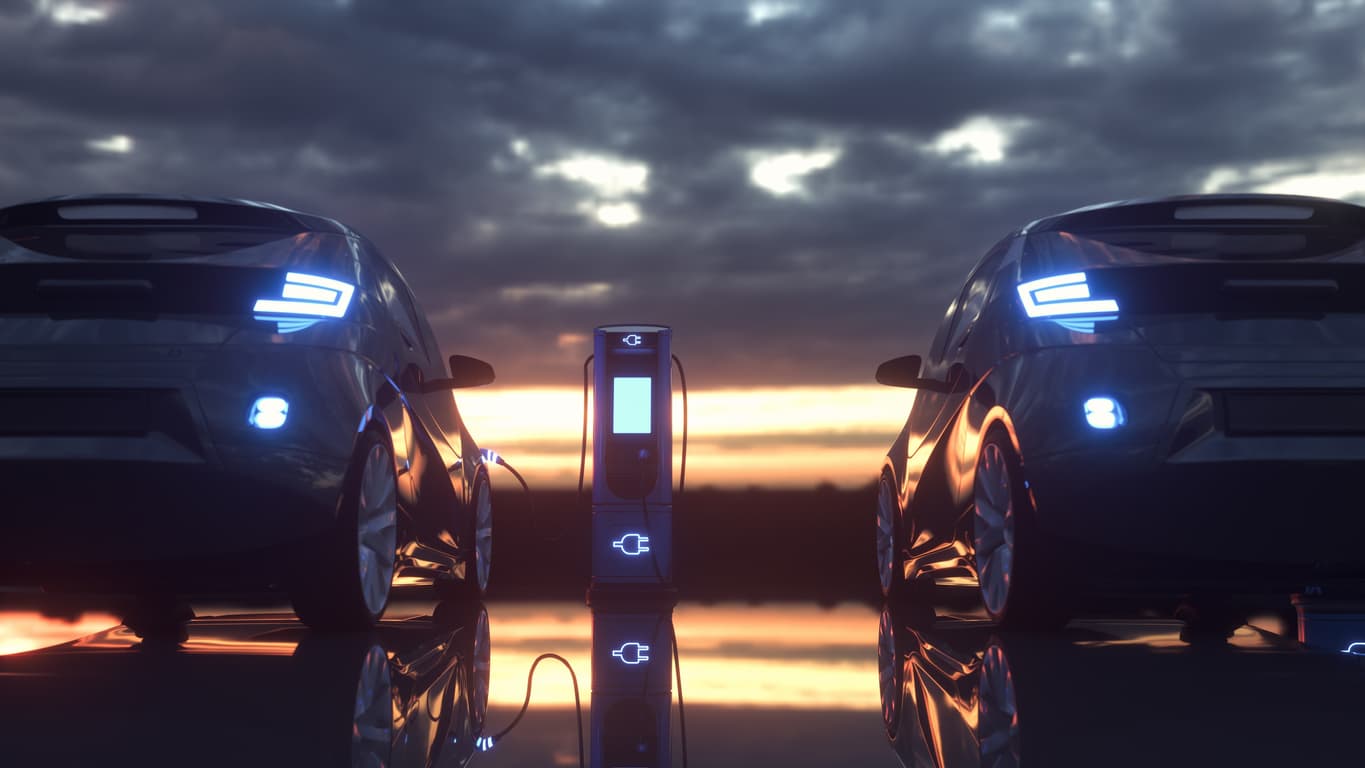 cars charging at a charging station