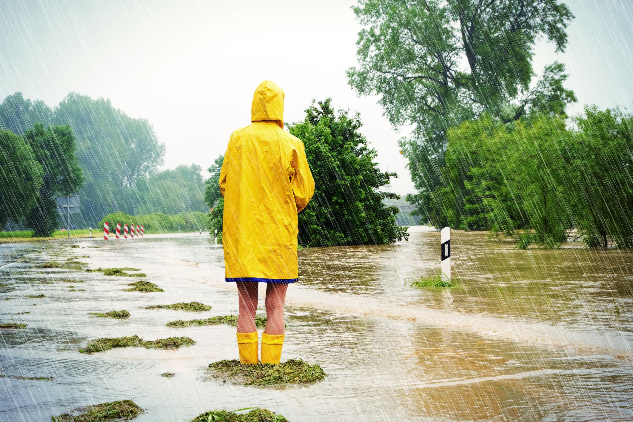 Person standing on a flooded street
